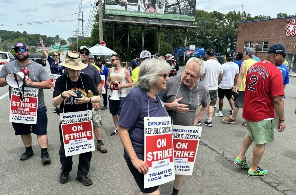 Sanitation Workers Strike for Fair Compensation Against Waste Disposal Giant